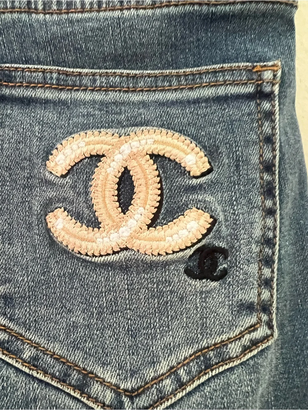 CHANEL Women's Blue Skinny Jeans with Gold-Tone Studs